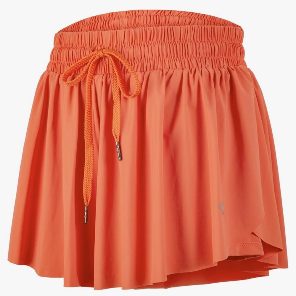 Orange flowy athletic shorts